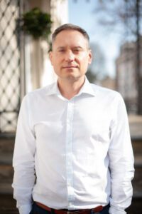 Richard Arthur Managing Director stood outside Hooray, a leading Recruitment agency in Cheltenham. 