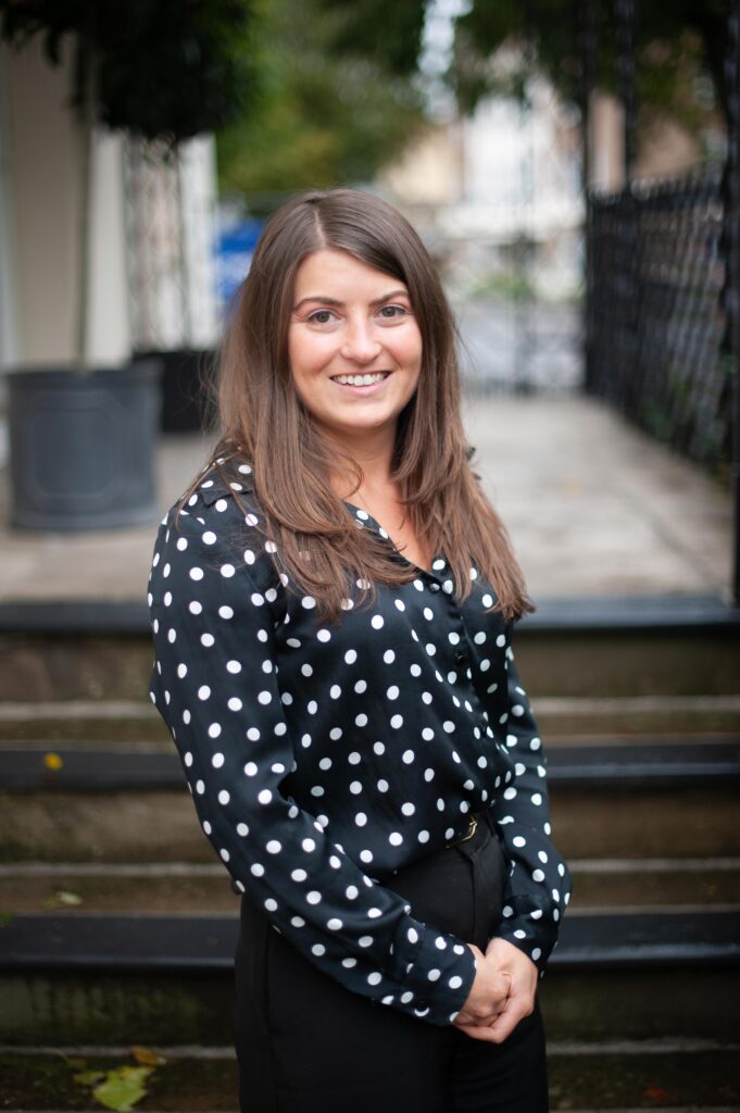 Sadie, Tech & Engineering Divisional Lead at Hooray Recruitment HQ in Cheltenham posing for a portrait 